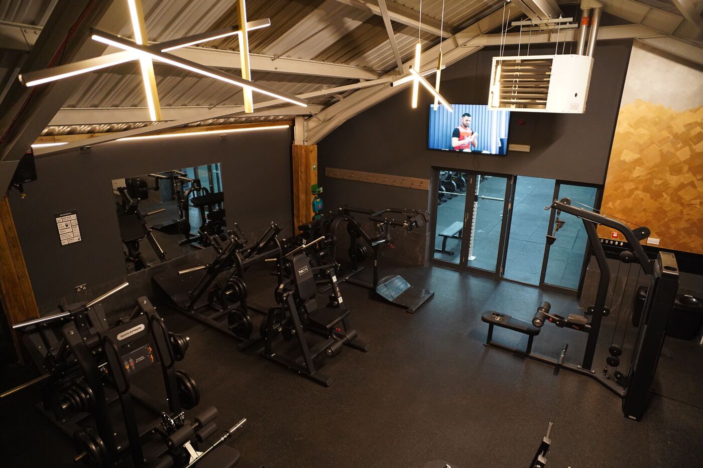 Plate loaded machines beneath the mezzanine